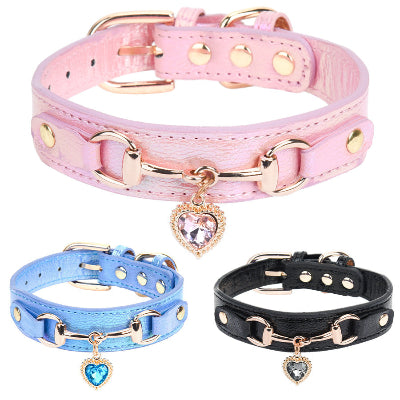 Trois collier pour chien coeur rose noir bleu